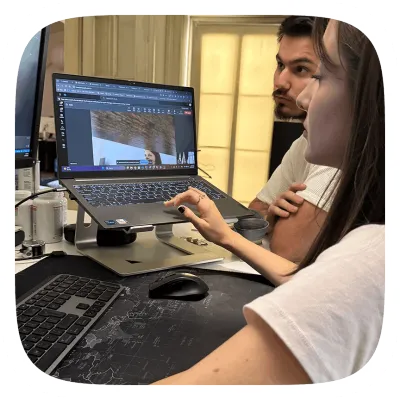 Pair programming session on laptop